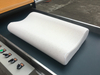 China fabricó automáticamente una máquina empacadora de rollos de almohada para empacar la cama en un rodillo